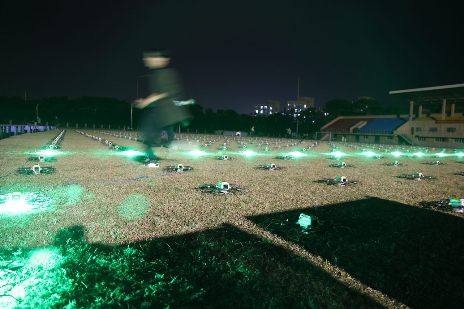 Green LED ground test with show drones on field